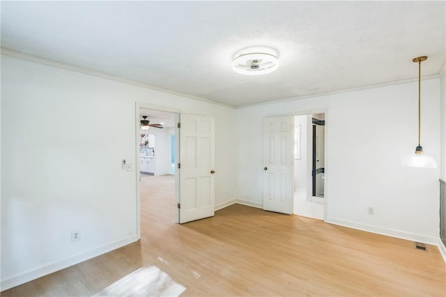 364 Stafford St SW, Marietta, GA 30064 - spare room featuring light wood finished floors, ornamental molding, and ceiling fan