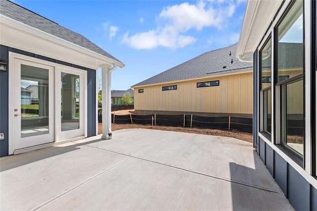 view of patio / terrace featuring fence