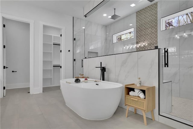 bathroom with plus walk in shower and tile patterned floors