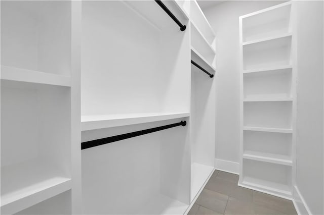 walk in closet featuring tile patterned floors