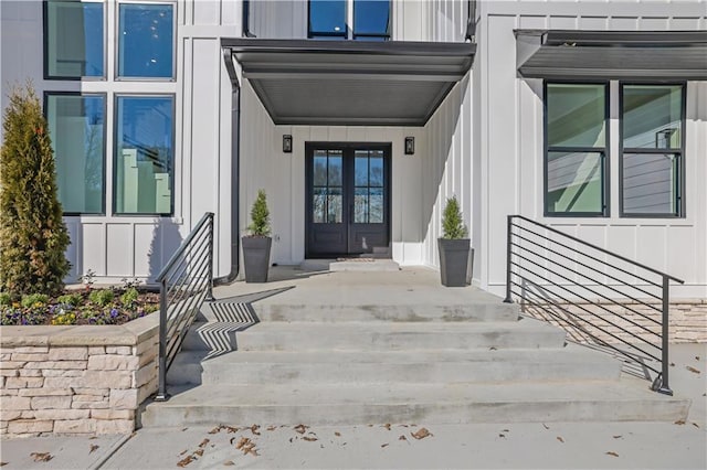 property entrance featuring french doors