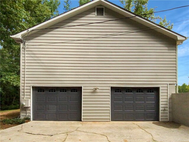 garage with wood walls