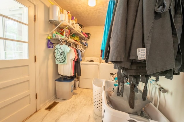 488 Truelove Rd, Cleveland, GA 30528 - spacious closet with independent washer and dryer and light marble finish floors