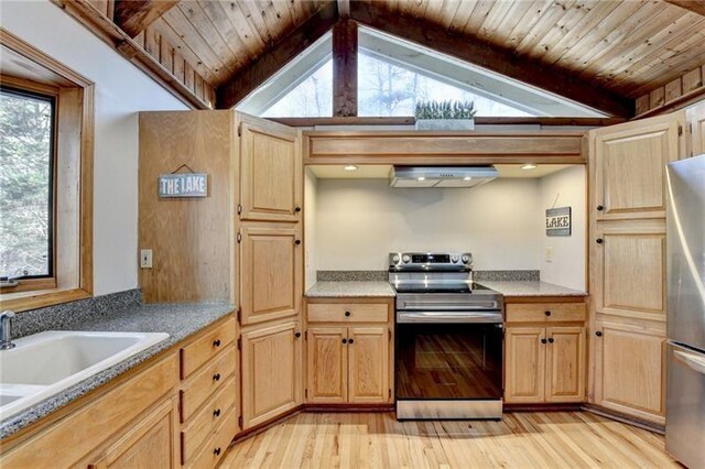kitchen with appliances with stainless steel finishes, light wood finished floors, under cabinet range hood, light brown cabinetry, and wood ceiling