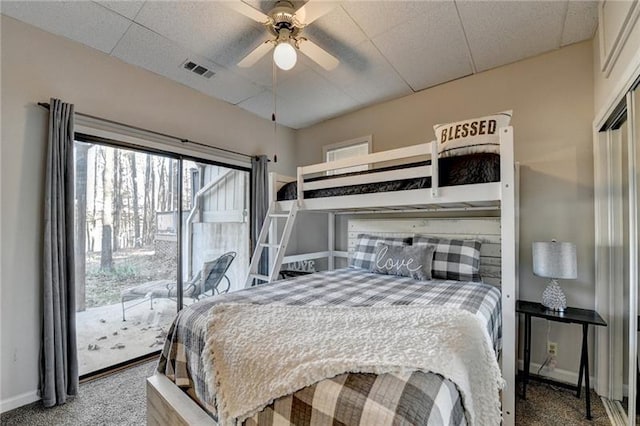 bedroom with baseboards and a ceiling fan