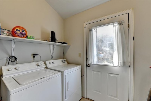washroom with washing machine and dryer