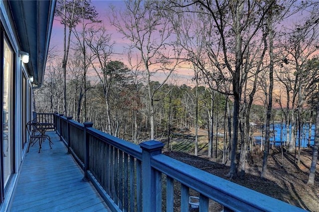 view of balcony at dusk