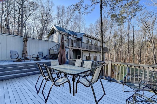 deck featuring outdoor dining space