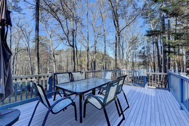 deck featuring outdoor dining area