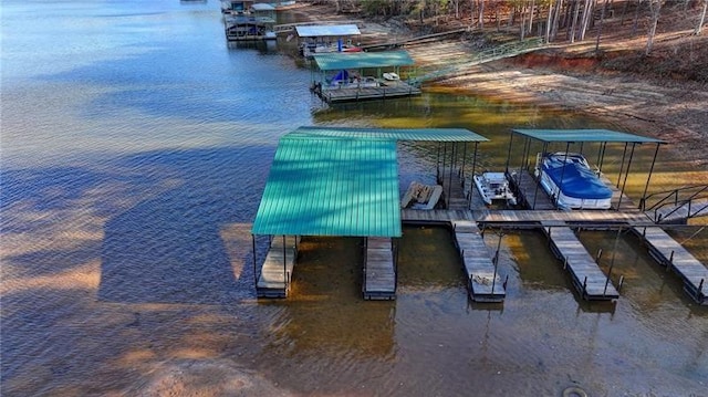 dock area with a water view