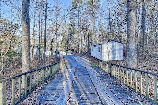 view of road with view of scattered trees
