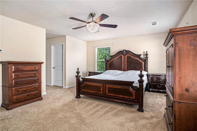 bedroom with baseboards, visible vents, ceiling fan, and light colored carpet