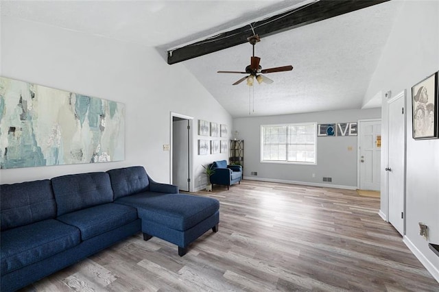 2103 Blue Creek Ct, Conley, GA 30288 - living room featuring beam ceiling, ceiling fan, light wood-style floors, and high vaulted ceiling