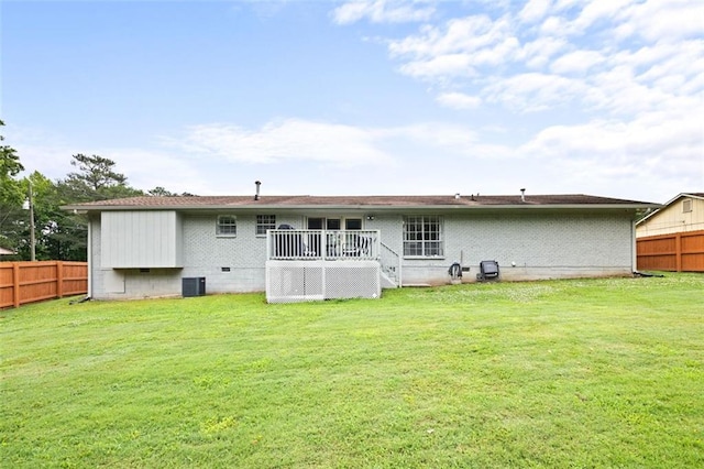 2103 Blue Creek Ct, Conley, GA 30288 - rear view of house with a wooden deck and brick siding