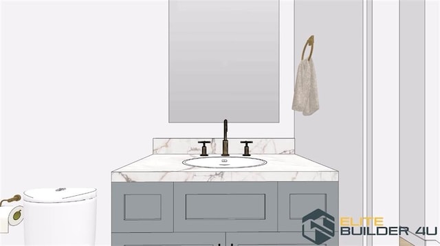 bathroom with vanity and toilet