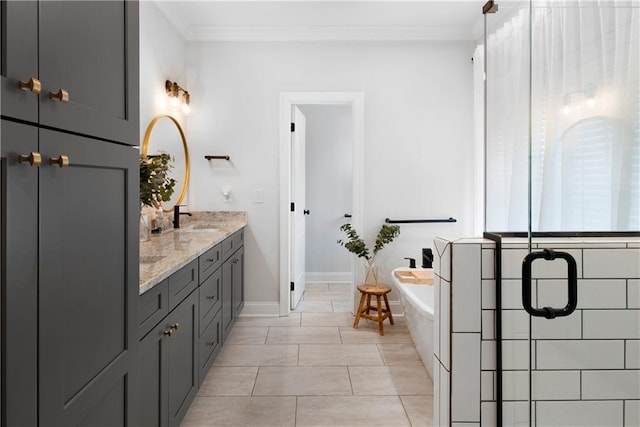 full bathroom with a freestanding tub, a stall shower, a sink, crown molding, and double vanity