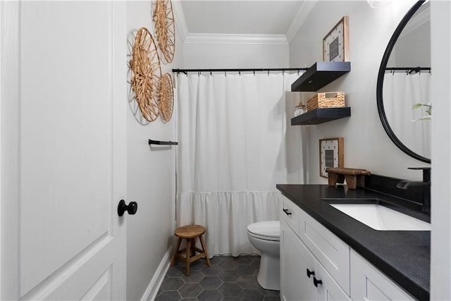 full bathroom with toilet, ornamental molding, tile patterned flooring, baseboards, and vanity