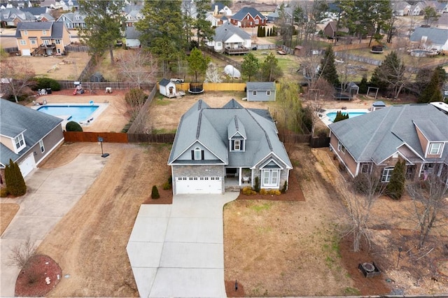 birds eye view of property featuring a residential view