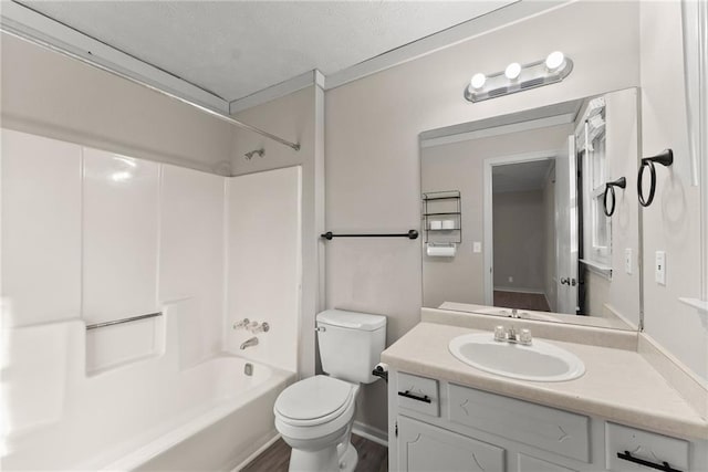 full bathroom with vanity, tub / shower combination, and toilet