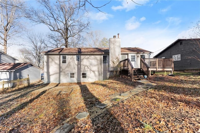 rear view of property with a deck