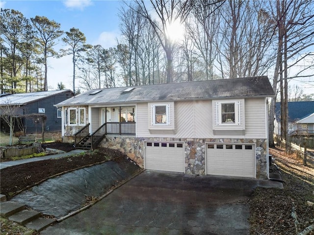 view of front of home with a garage