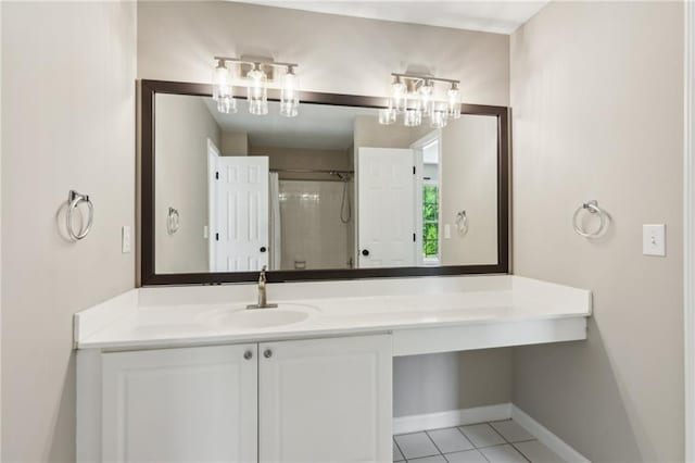 full bathroom with baseboards, a shower with door, tile patterned floors, and vanity