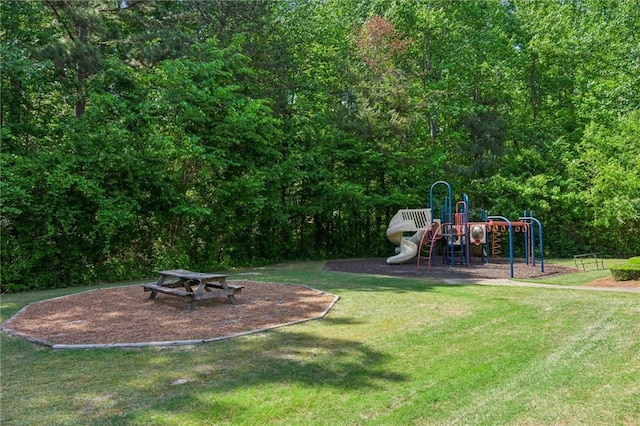 communal playground with a lawn