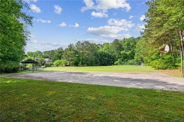 exterior space with a gazebo and community basketball court