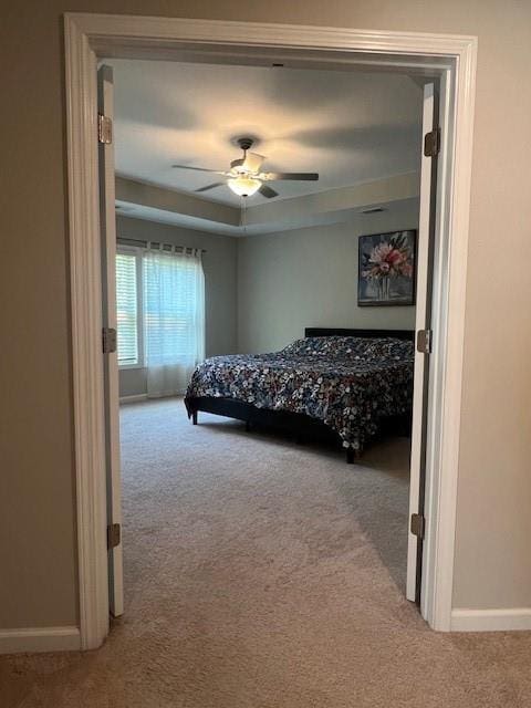 239 Lenore Ct, Hiram, GA 30141 - carpeted bedroom with baseboards and a ceiling fan