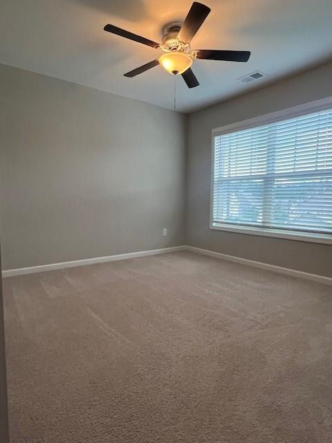 239 Lenore Ct, Hiram, GA 30141 - empty room with carpet flooring and a ceiling fan