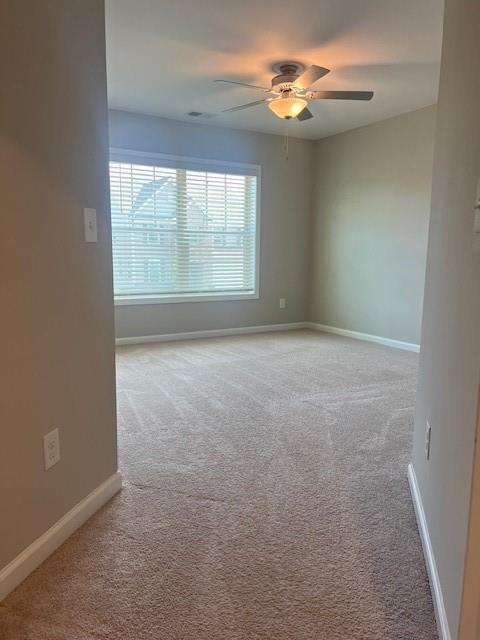 239 Lenore Ct, Hiram, GA 30141 - empty room featuring carpet flooring and ceiling fan