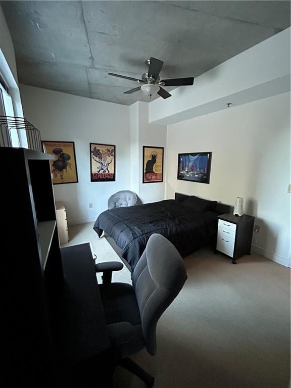 bedroom featuring ceiling fan and carpet flooring