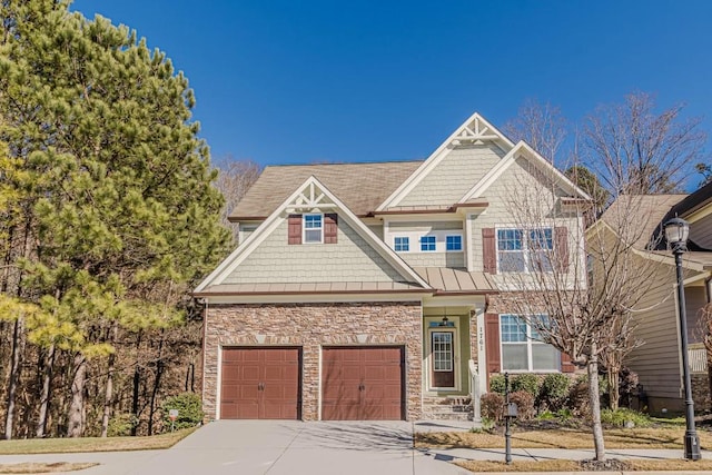 craftsman house with a garage