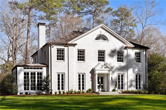 3051 Habersham Rd NW, Atlanta, GA 30305 - view of front of house featuring a chimney and a front yard