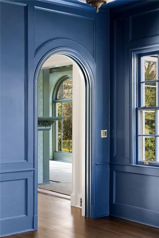 3051 Habersham Rd NW, Atlanta, GA 30305 - entrance foyer with wood finished floors and arched walkways