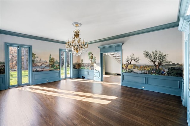 3051 Habersham Rd NW, Atlanta, GA 30305 - unfurnished dining area featuring an inviting chandelier, ornamental molding, and wood finished floors