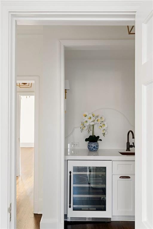 3051 Habersham Rd NW, Atlanta, GA 30305 - bar featuring wood finished floors, wine cooler, indoor wet bar, and a sink