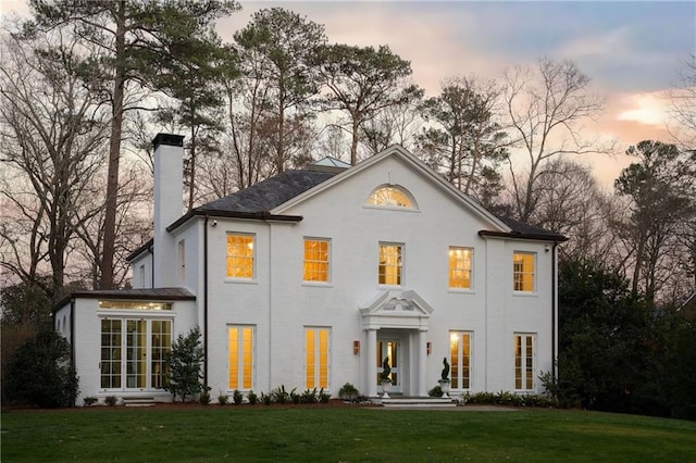 3051 Habersham Rd NW, Atlanta, GA 30305 - view of front of property with a front yard and a chimney