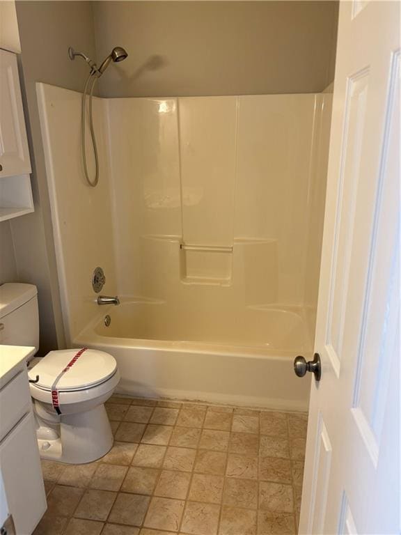 full bathroom with tile patterned flooring, vanity, toilet, and shower / washtub combination