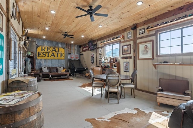 interior space with wooden ceiling and ceiling fan