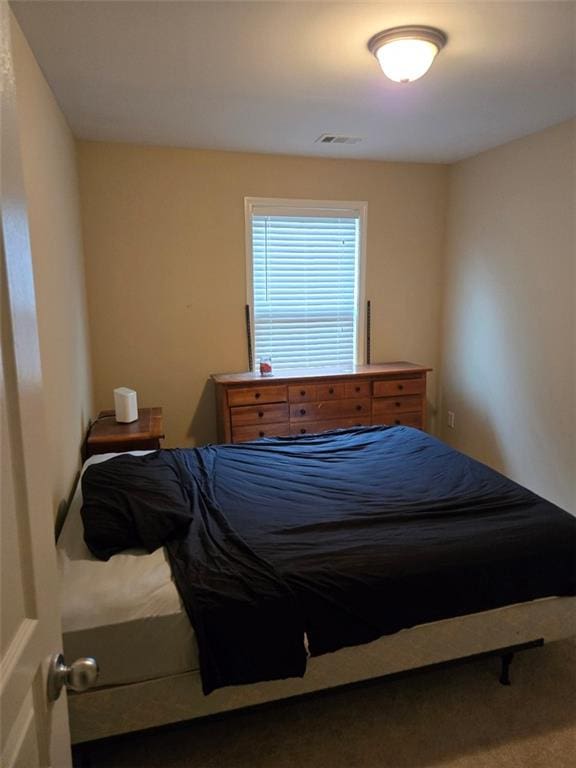 bedroom with visible vents