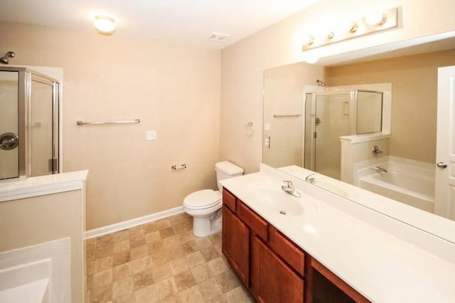 full bath featuring a garden tub, toilet, vanity, baseboards, and a shower stall