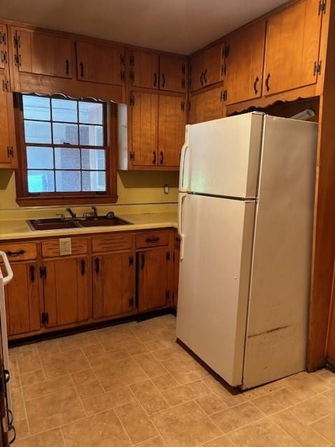 1902 Godby Rd, Atlanta, GA 30349 - kitchen featuring sink and white refrigerator