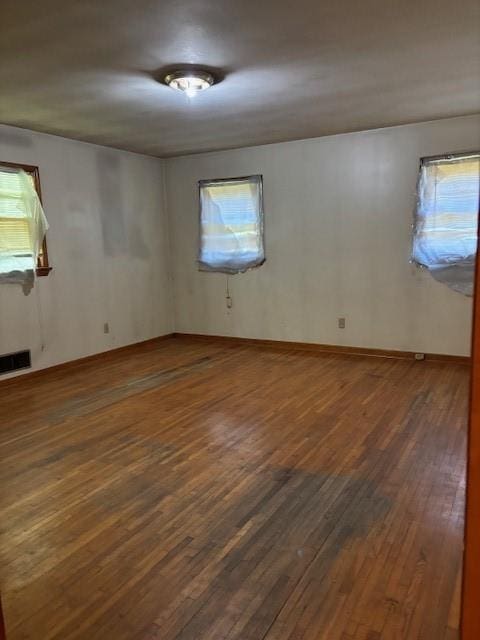 1902 Godby Rd, Atlanta, GA 30349 - empty room with dark hardwood / wood-style floors