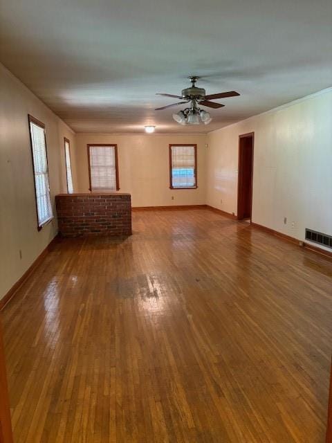 1902 Godby Rd, Atlanta, GA 30349 - unfurnished living room with wood-type flooring and ceiling fan