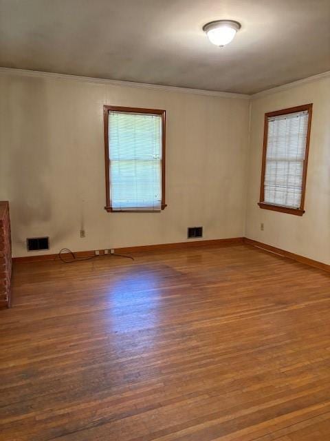 1902 Godby Rd, Atlanta, GA 30349 - spare room with ornamental molding and wood-type flooring