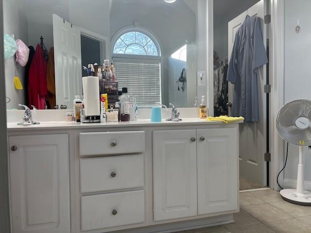 bathroom with vanity and tile patterned floors