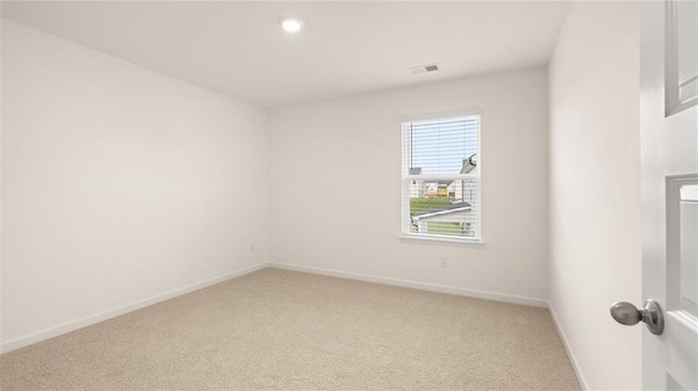 unfurnished room featuring carpet floors