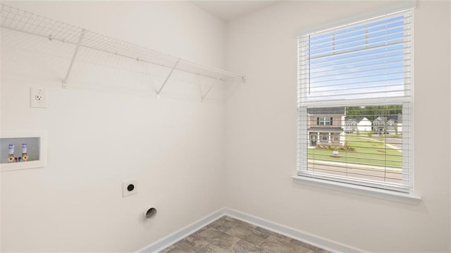 laundry room with electric dryer hookup, a healthy amount of sunlight, and hookup for a washing machine