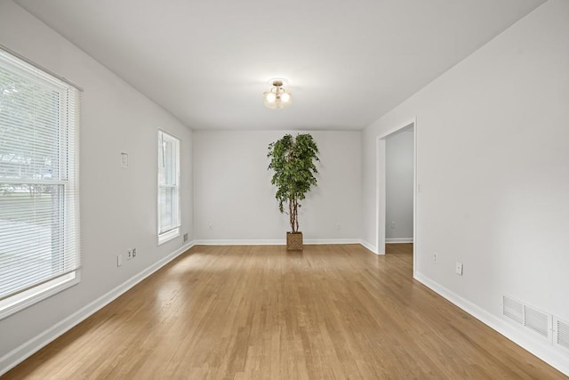 empty room with light wood-type flooring